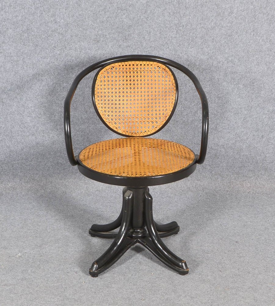 Drehstuhl, Thonet '550', Bugholz, mit Wiener Geflecht, Sitz drehbar, auf 4-strahl. Stand