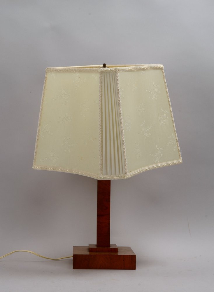 Tischlampe, 1-fl., Holzschaft furniert, mit Schirm, funktionstüchtig; Höhe 65 cm