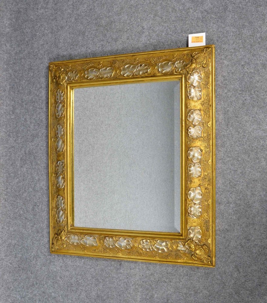 Wandspiegel, Goldrahmen mit Silberstaffage, fac. Spiegelglas; Maße 70 x 60 cm
