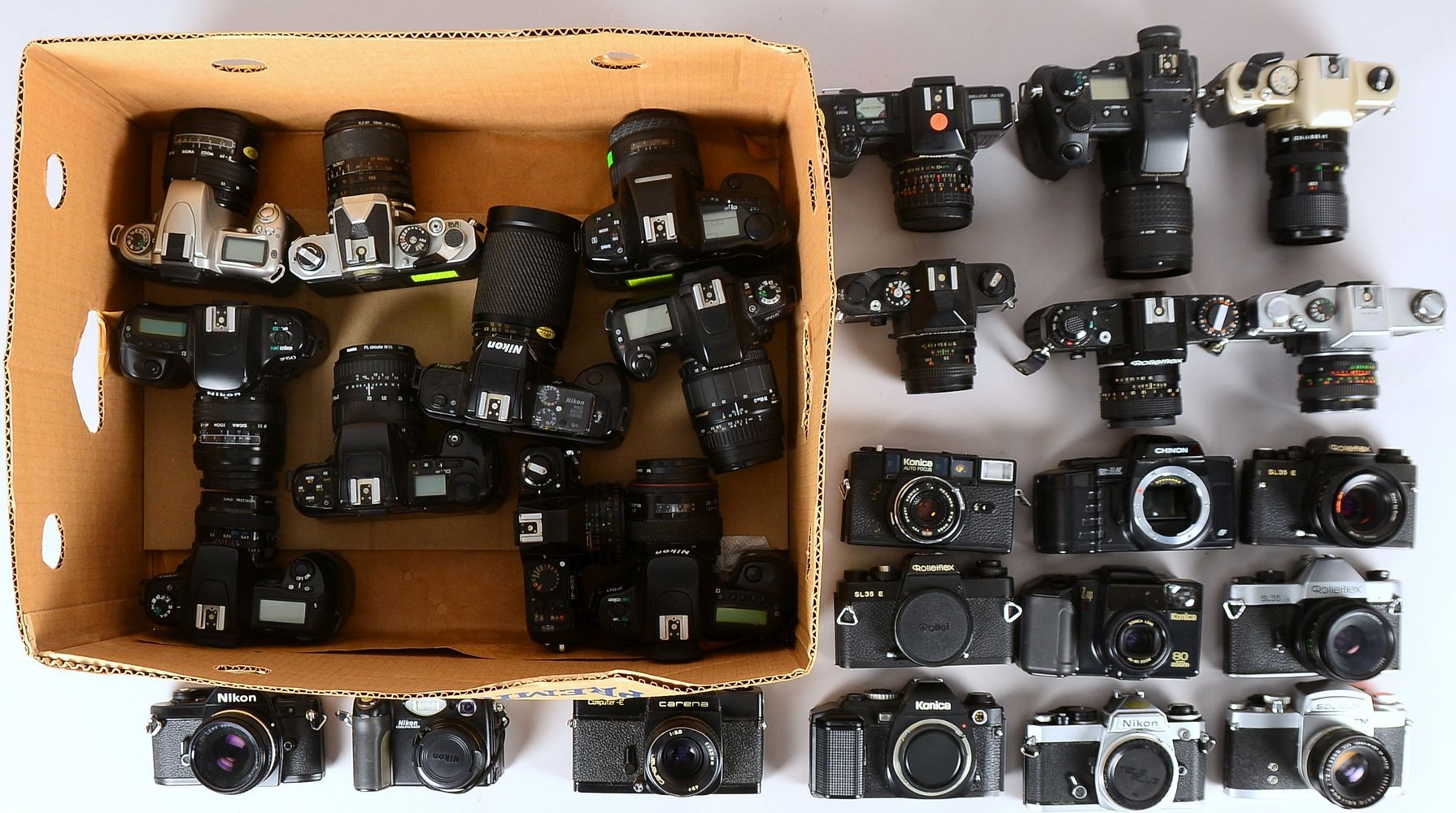 Nikon-/Rolleiflex-Kameras: versch. Mod. ('F-601', 'F 50', 'SL 35', u.a.), mit Obj., 28 St.