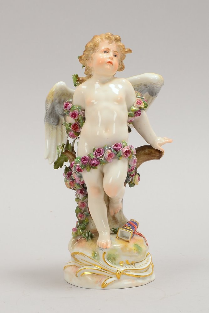 Meissen, Porzellanfigur, 'Gefesselter Amor', auf Rocaillensockel; Höhe 19 cm