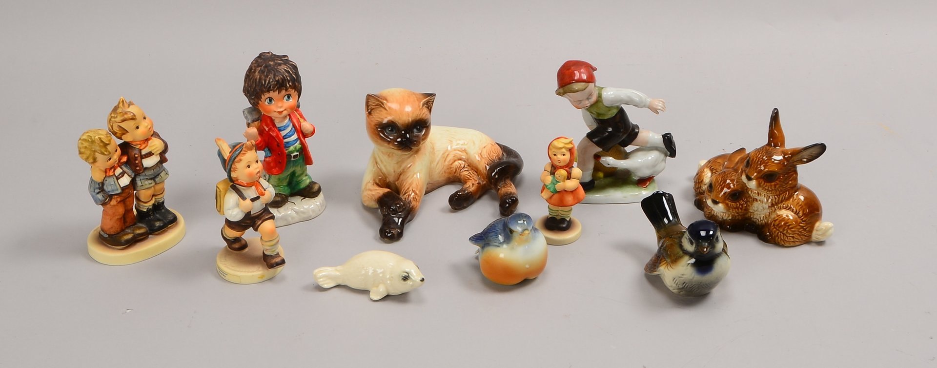 Goebel, kleines Porzellanfiguren-Konvolut, versch. Ausf., 8 Stück, dazu 2x weitere
