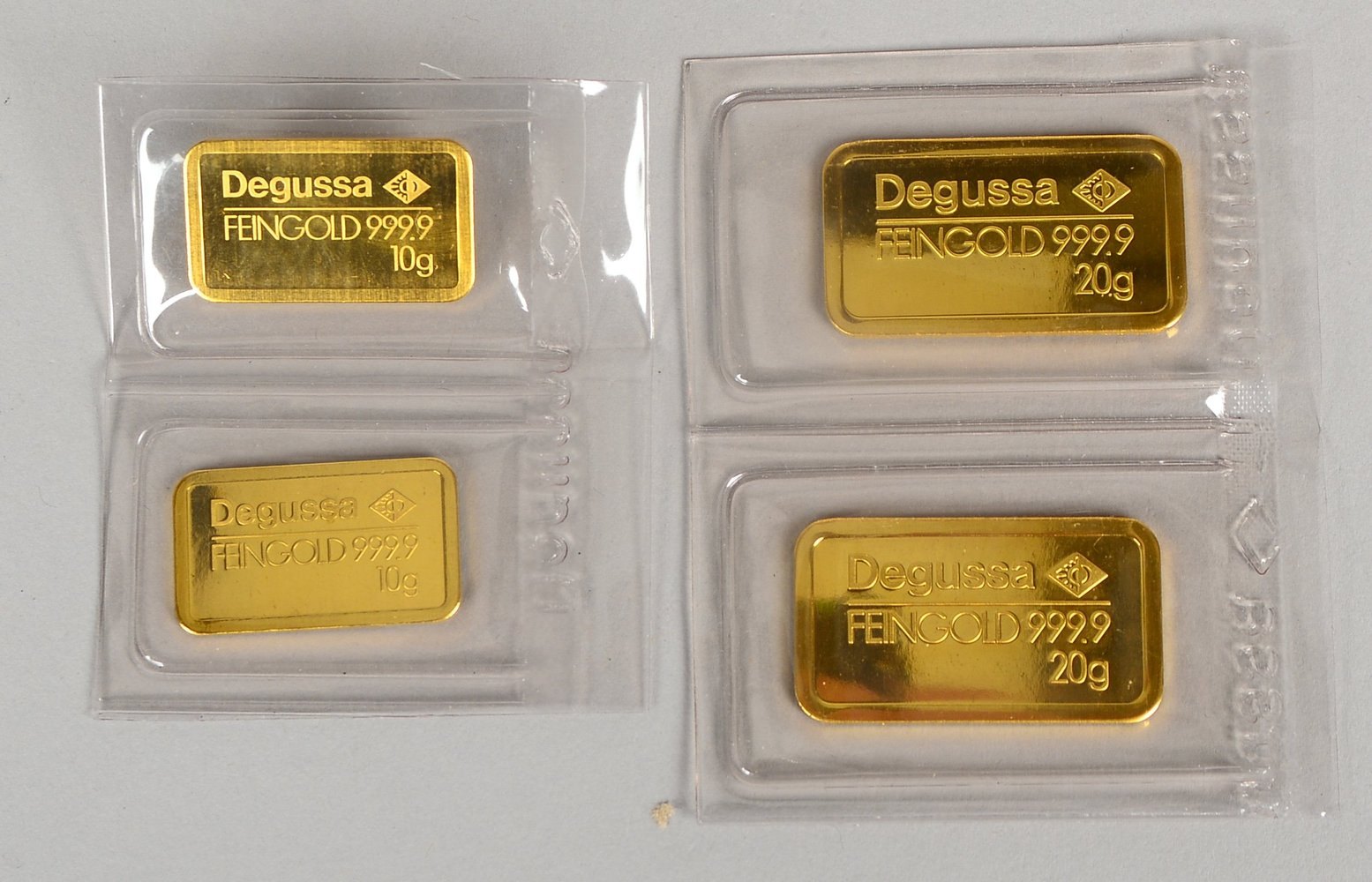 Degussa, 4 Feingold-Barren, 999,9/1.000: 2x à 20 g, und 2x à 10 g - in OVP; Gew. 60 g