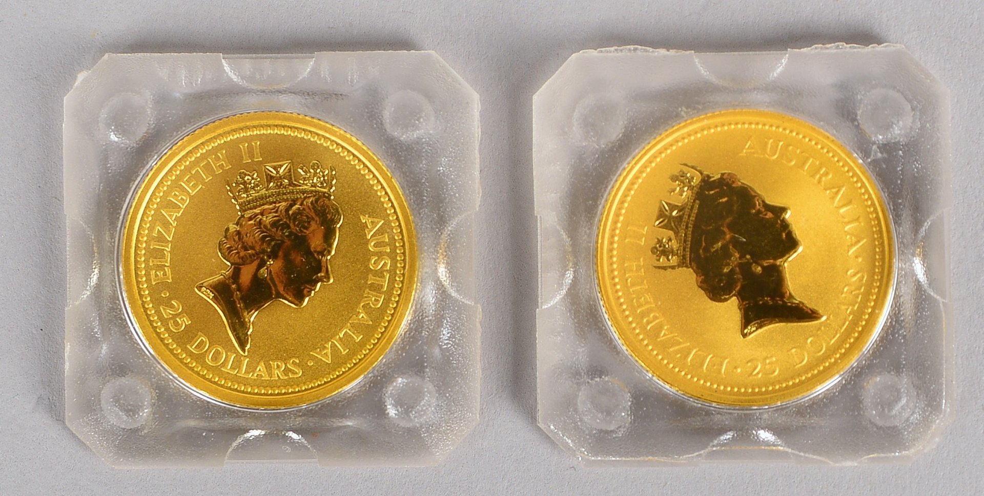 'Austral. Nugget, 1993', 999,9/1.000 Feingold, Gew. 1/4 oz; und '25 Dollars - Eliz. II'