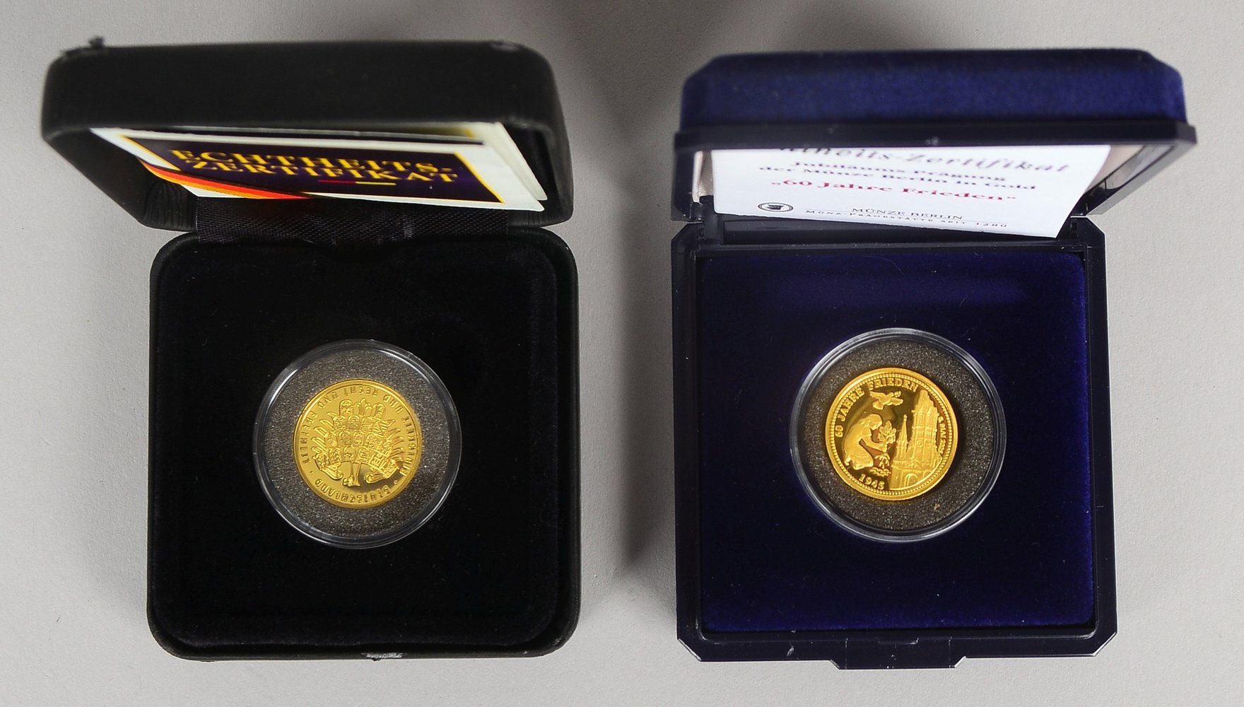 2 Gedenkm., 585/1.000 Feingold: 1x 'FIFA WM 2006', und '60 J. Frieden'; Gew. ca. 7 g