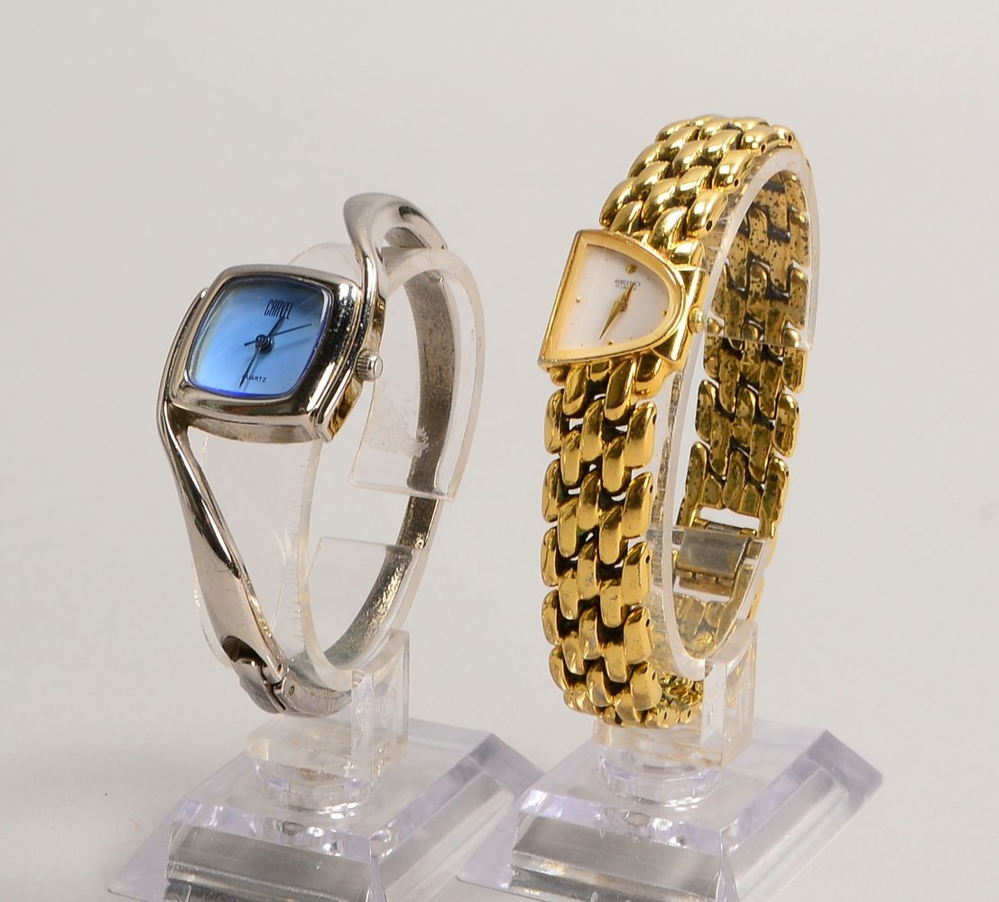 2 DAU, Quarz: Seiko, in Goldaufl., und Carvel, Spangenuhr/mod. Form - Fkt. ungeprüft