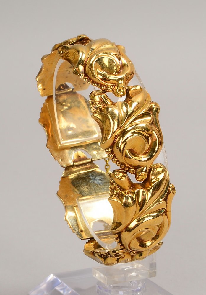 Armband (Biedermeier), 585 GG (gepr.), relief. Hohlglieder, mit Steckschl., Sicherheitsk.