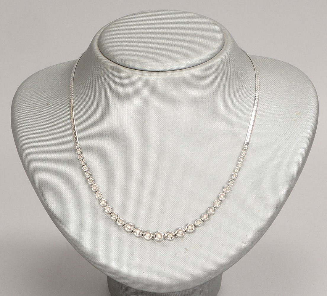 Collier, 585 WG (gest.), mit 31x kl. Brill./ca. 0,56 ct, 'H-I', 'Si-P1', Steckschl.; Gew. 14,30 g