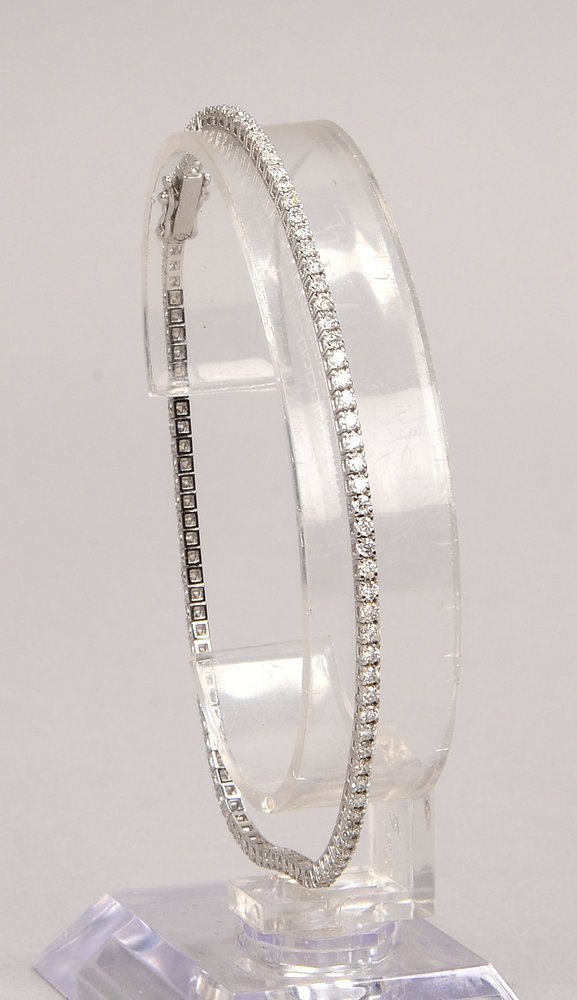 Tennisarmband, 750 WG (gest.), mit 104x Brill./zus. ca. 2,10 ct, 'F-Vsi'; Gew. 5,90 g