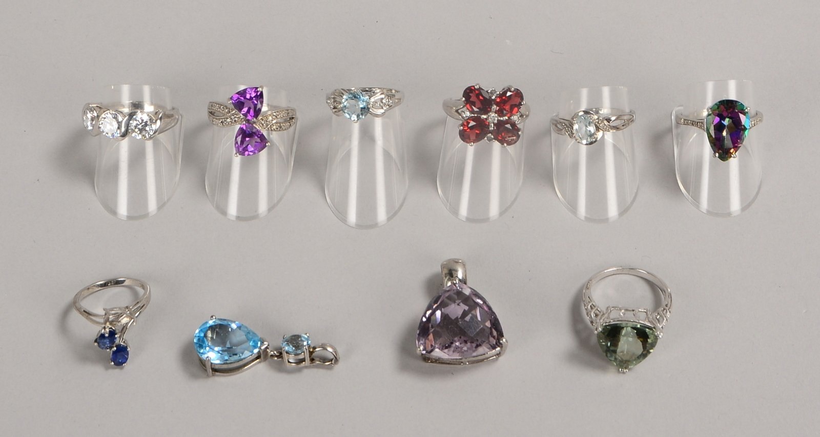 Silberschmuck, untersch. Steinbesatz, 10 Teile: 2x Anh. und 8x Ringe; Gew. 40,50 g