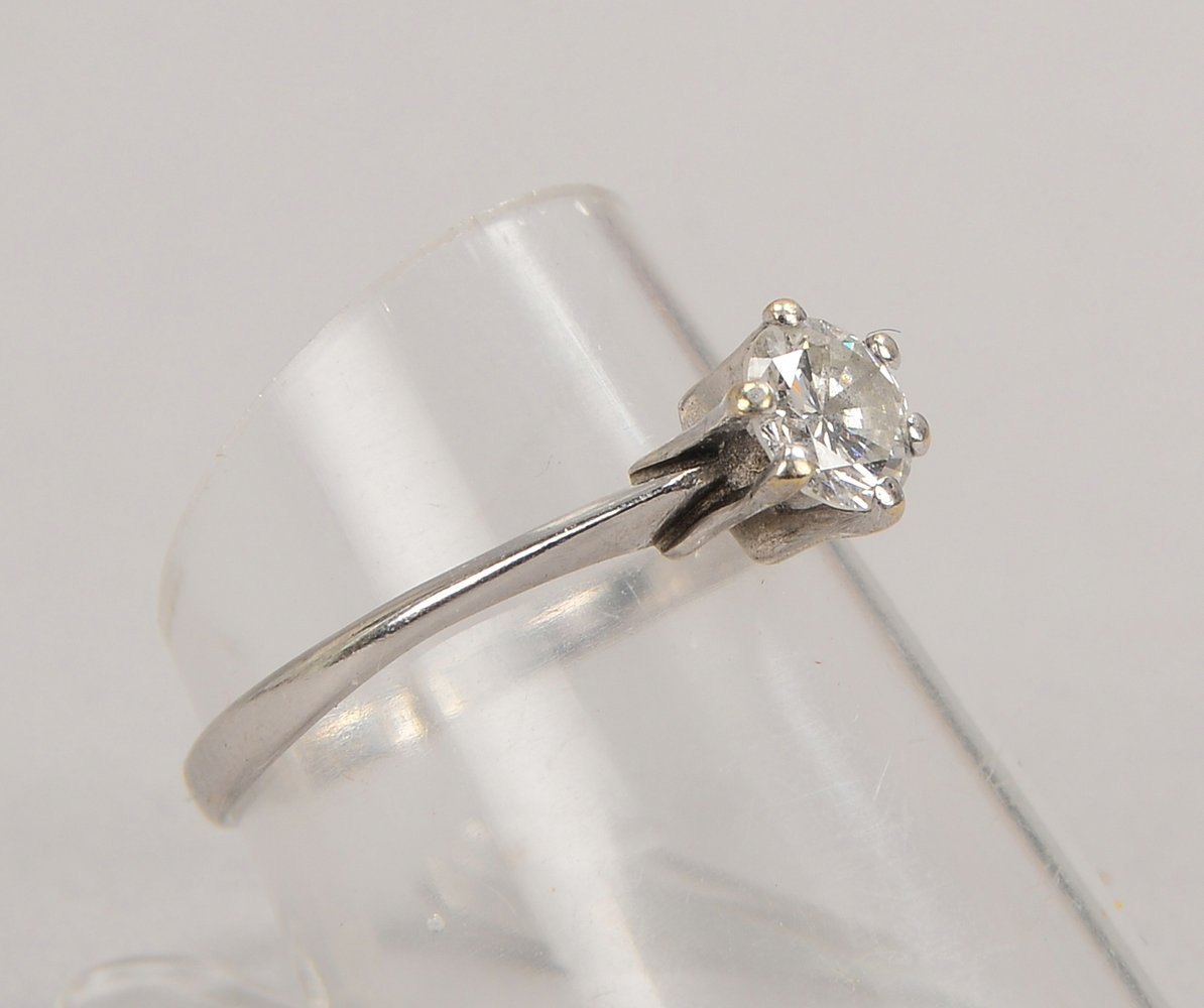 Solitärring, 585 WG (gestempelt), besetzt mit einzelnem Brillant von 0,53 ct, Farbe 'G-H', 'LR-Vvsi'