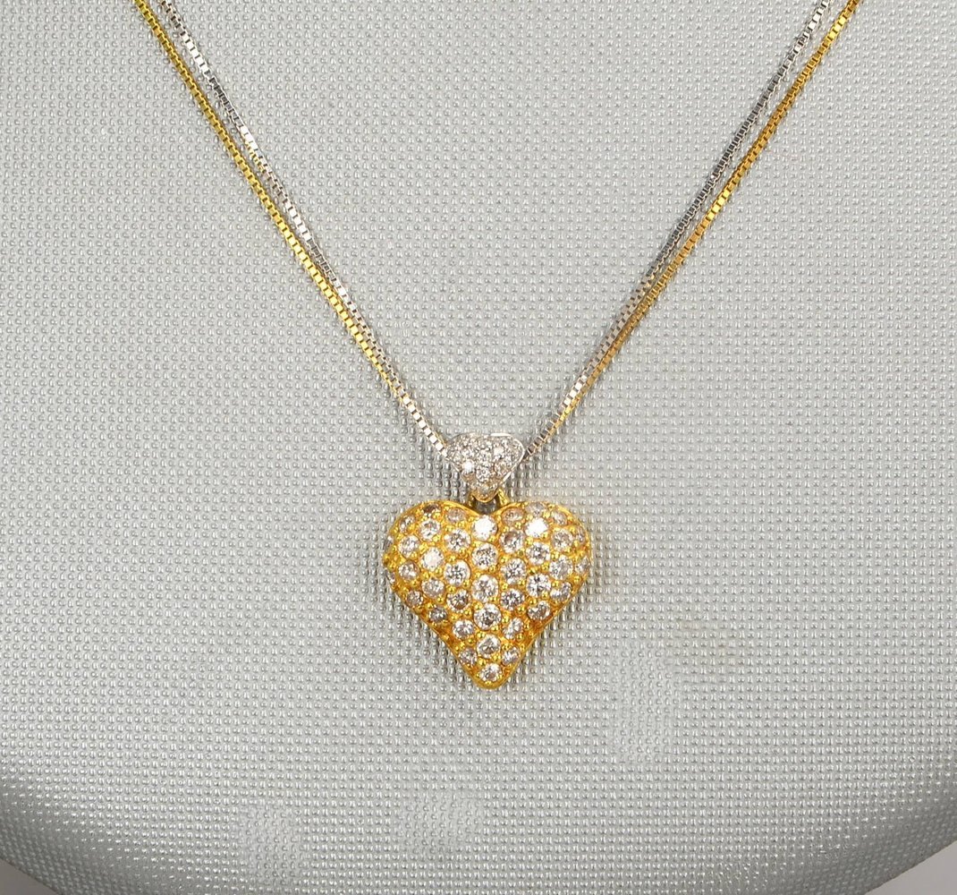 Collier mit Anh., 750 GG/WG (gest.), 2-str. Kette, 'Herz'-Anh. mit Diam.; Gew. zus. 5,48 g