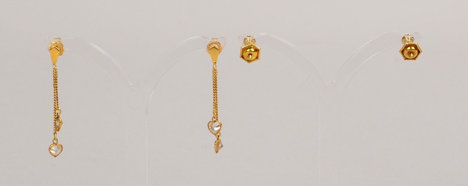 2x Ohrstecker, 585 GG, mit Brill.; und 1x Ohrhänger, 333 GG, mit Zirkonen(?)