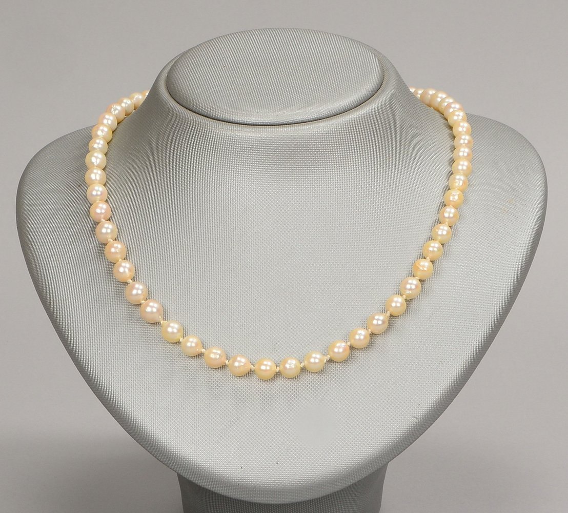 Perlenkette, einzeln gekn., Perle Ø 6 mm, mit 585 WG-Schließe (gest.); Länge 6o cm