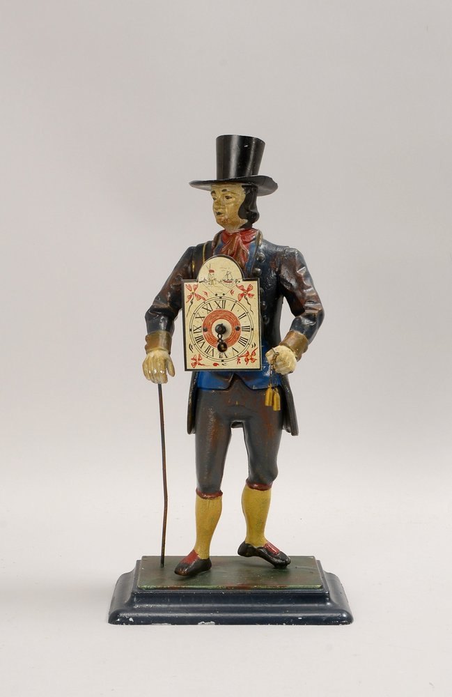 'Uhrenmännchen' (Schwarzw.), fig. Metallguss-Geh./polychr. gef., unters. gem. 'J.v.E.'
