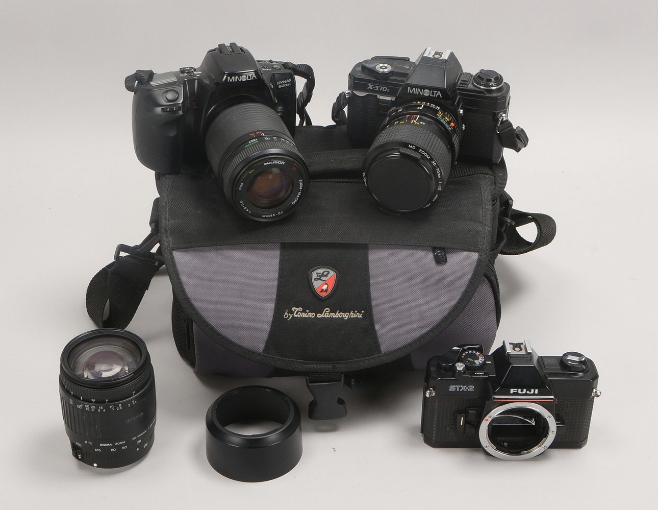 3x Sammler-Kameras (2x Minolta/1x Fuji), mit 3x Obj. (Minolta, Sigma, Soligor)