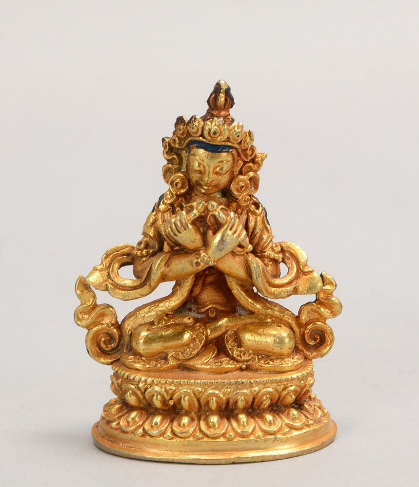 Kl. Bronzefigur (Nepal), 'Reise-Buddha' (mit gekreuzten Armen dargest.), vergoldet