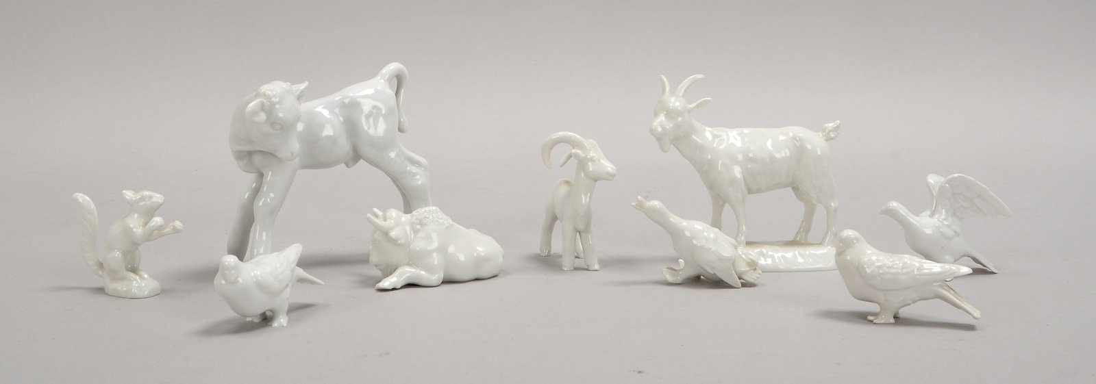 KPM Berlin, 9 Porz.-Tierfiguren: 'Kalb', 'Bison', 'Ziege', 'Eichhörnchen', u.a.