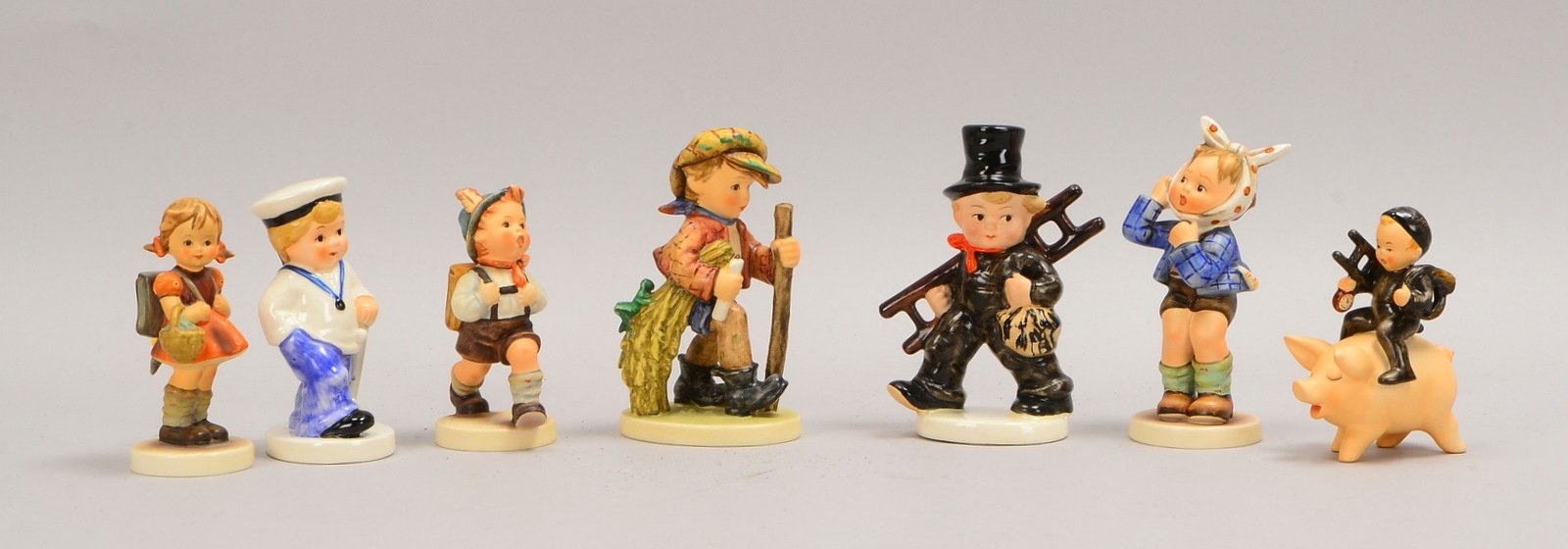 Goebel, 7x Keramikfiguren, unterschiedl. Zeiten und Motive; verschiedene Größen