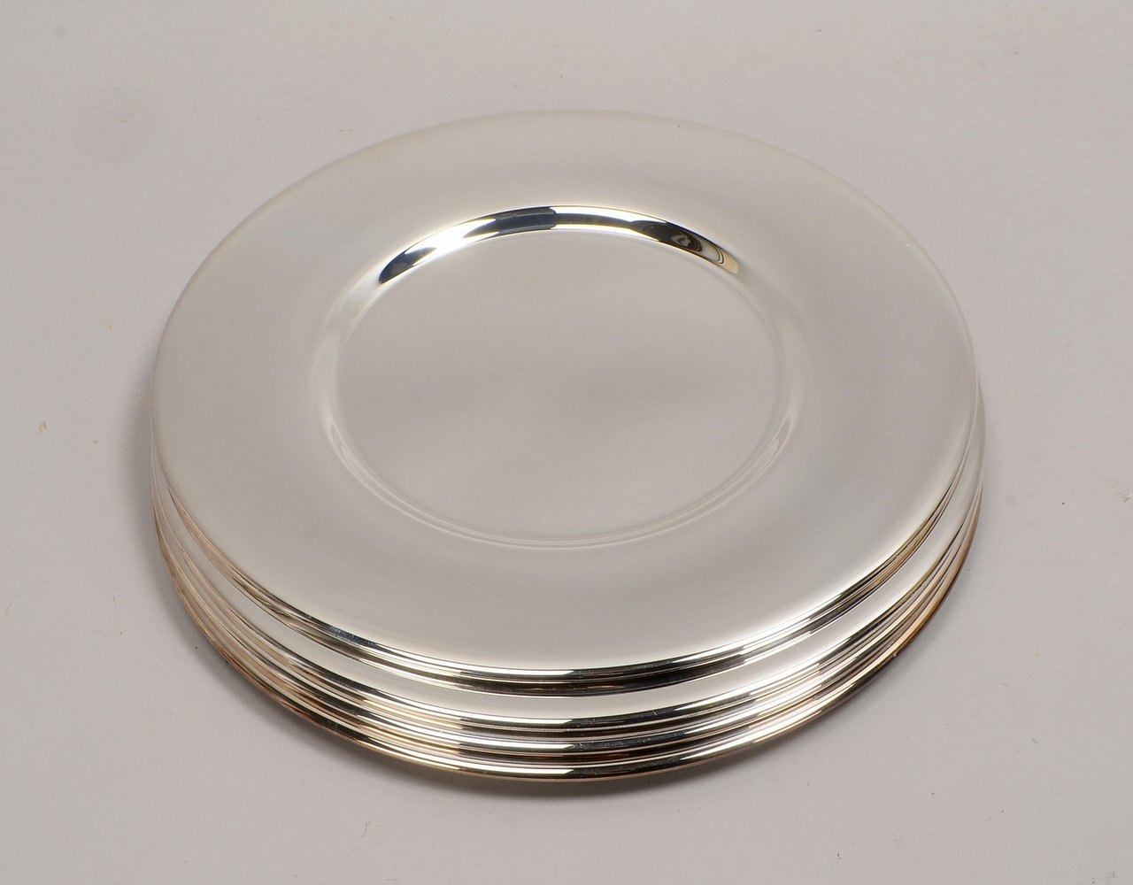 Wilkens, 4-tlg. Satz Platzteller, 925 Sterlings., Form 'Silhouette'; Ø 30 cm, Gew. 2.396 g
