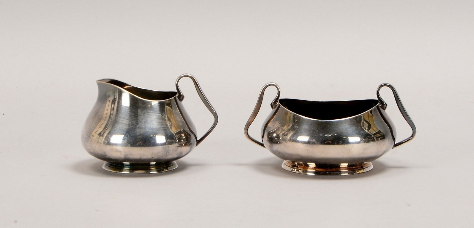 Zuckertopf und Sahnebehälter (Art déco-Ausf., DK), 925 Silber; Gew. 332 g