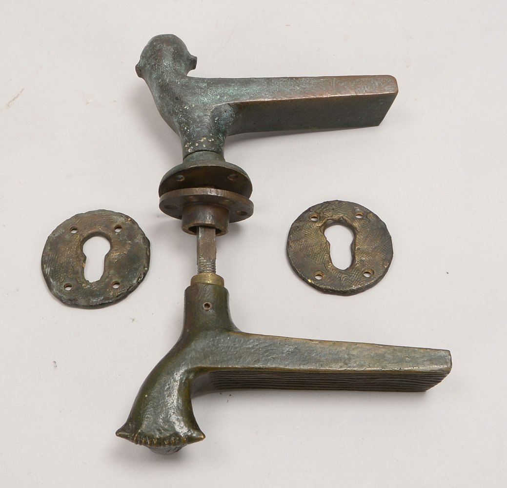 Engelin, Karl H., Bronze-Türbeschlag, 2x Klinkenmotive innen/außen, mit Rosetten, sign.