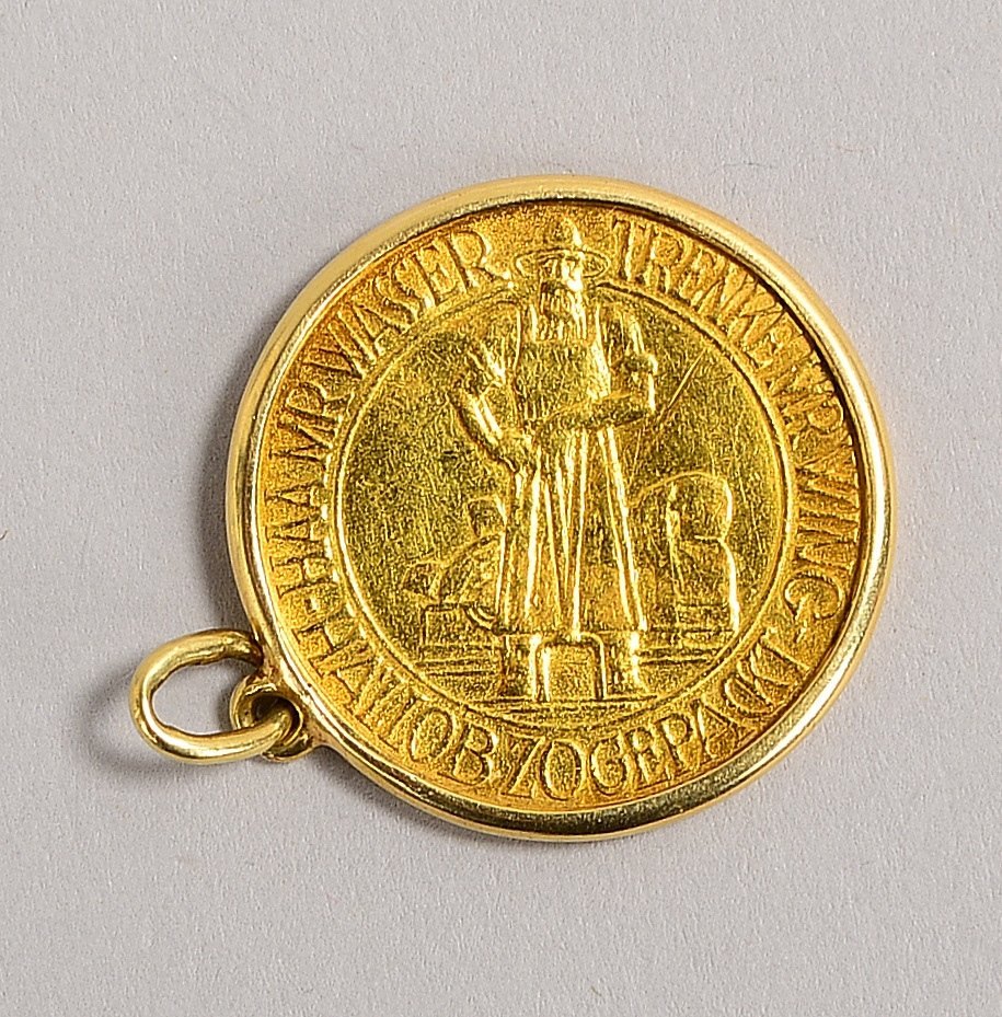 Gedenkmünze, 900/1.000 Feingold, Gew. 3,82 g; in 585 Goldfassung, Gew. ca. 1,20 g