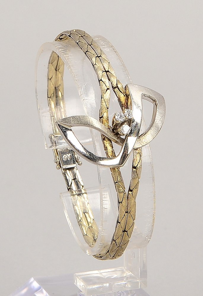 Armband, 585 WG (gest.), mit 3x kl. Brill., Steckschließe; Länge 16 cm, Gew. 17,80 g