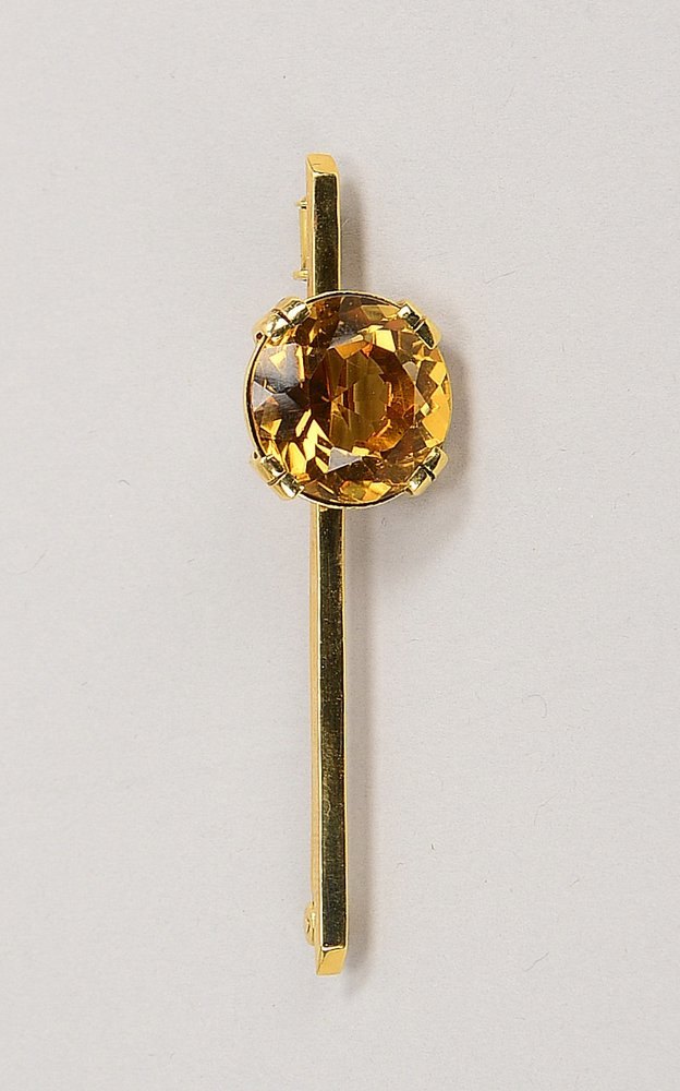 Brosche, 585 GG (gest.), besetzt mit rundem Citrin/Ø 15 mm; Länge 6 cm, Gew. 8 g