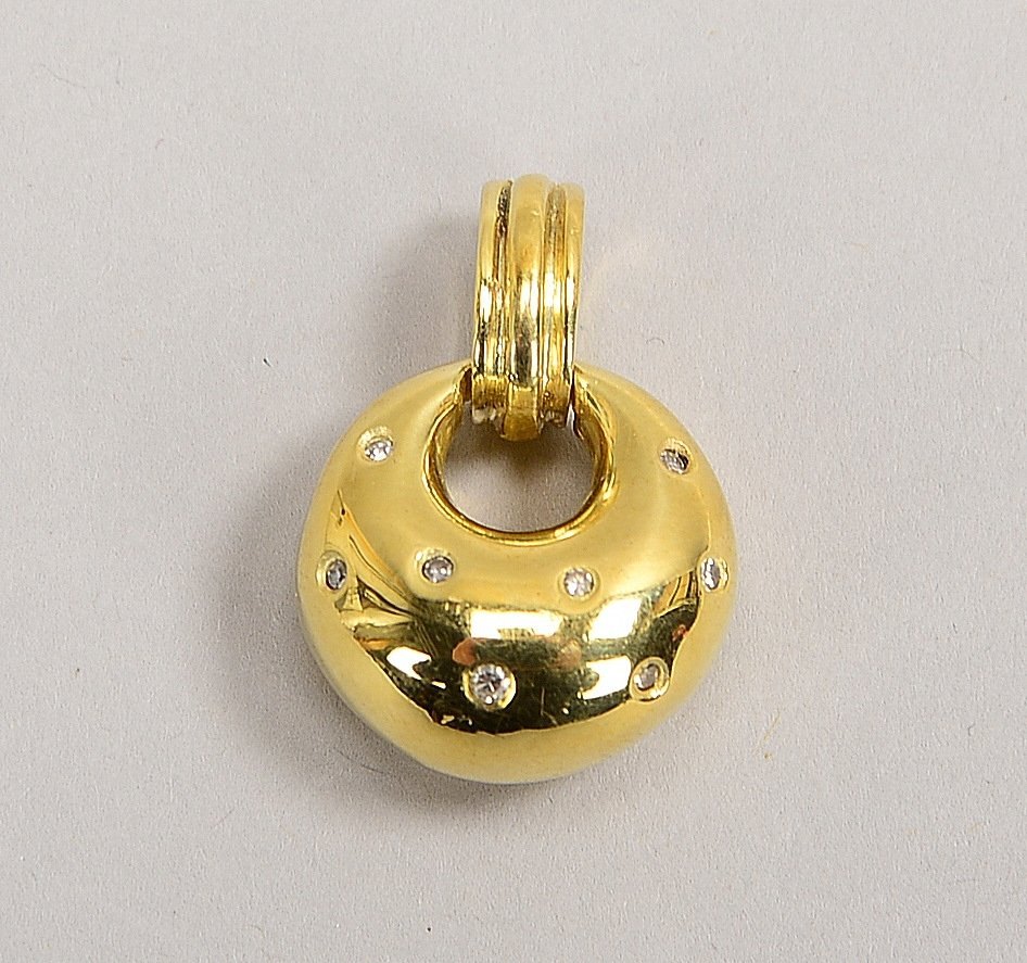 Anhänger, 585 GG (gest.), besetzt mit 3x kl. Diam., mit Clipschließe; Ø 1,8 cm, Gew. 8,50 g