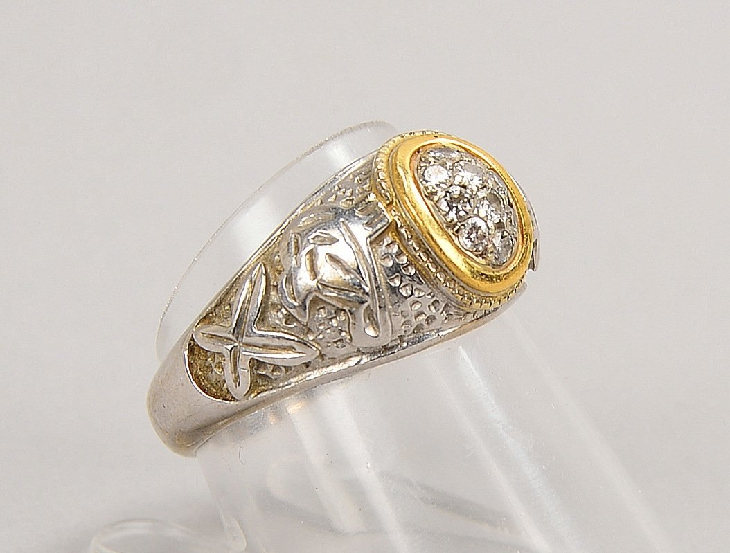 Ring, 750 GG/WG (gest.), mit 10x kl. Diam./ca. 0,20 ct; RG 55, Gew. 7,30 g