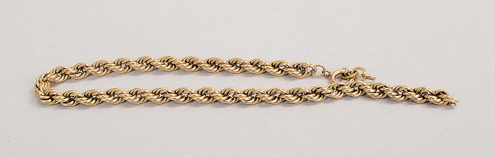 Kordelarmband, 333 GG (gest.), Federringschließe; Länge 21 cm, Gew. 5,20 g (offen!)