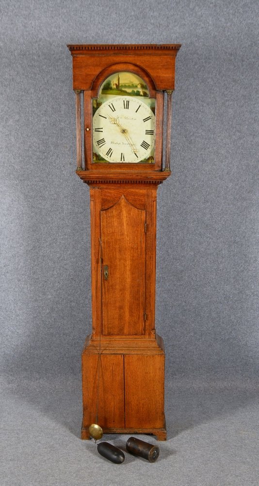 Engl. Standuhr, Eiche, Ziffernblatt mit röm. Ziffern/bez., Räderwerk, Schlag auf Glocke