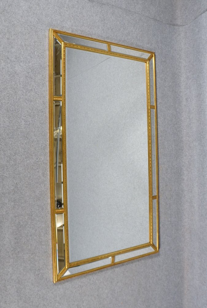 Gr. Wandspiegel, Holzrahmen vergoldet, fac. Spiegelglas, Aufh. vertikal/horizontal
