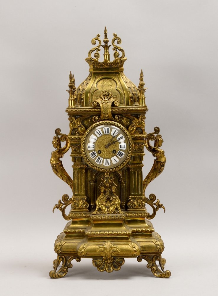 Salonuhr, Schlag/Glocke, architekton. Bronze-Geh./Kathedralenform, 2x figürl. Handh.