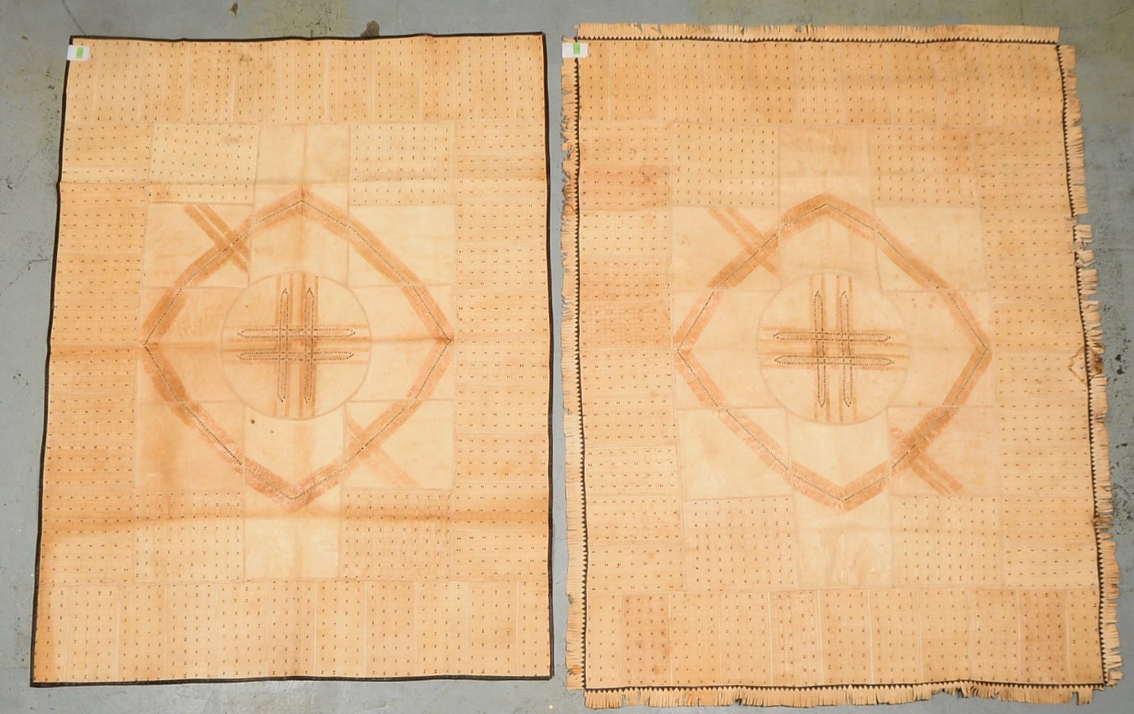 2 Lederteppiche, in Patchwork-Technik, korrespond. Farben/Muster; Maße 213 x 163 cm