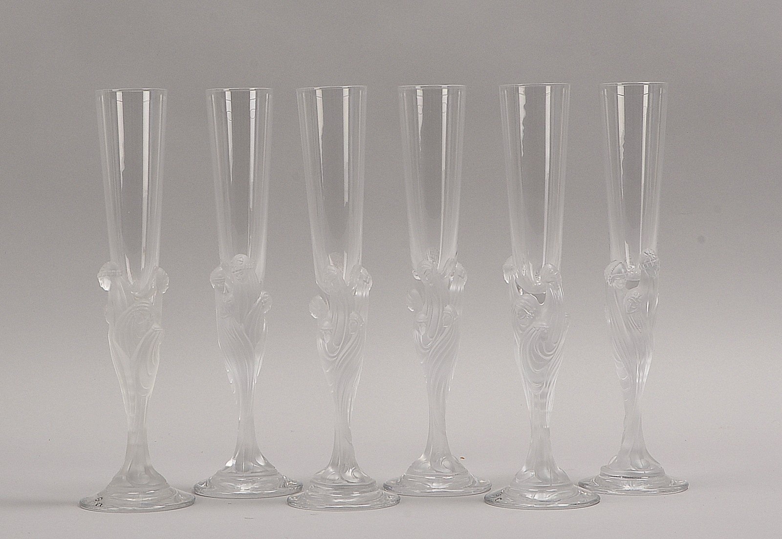 Crist. de Sèvres, 6 Champagnerflöten, Stiel mit 'Frauenkopf'-Darst., Entw. Erté, sign.