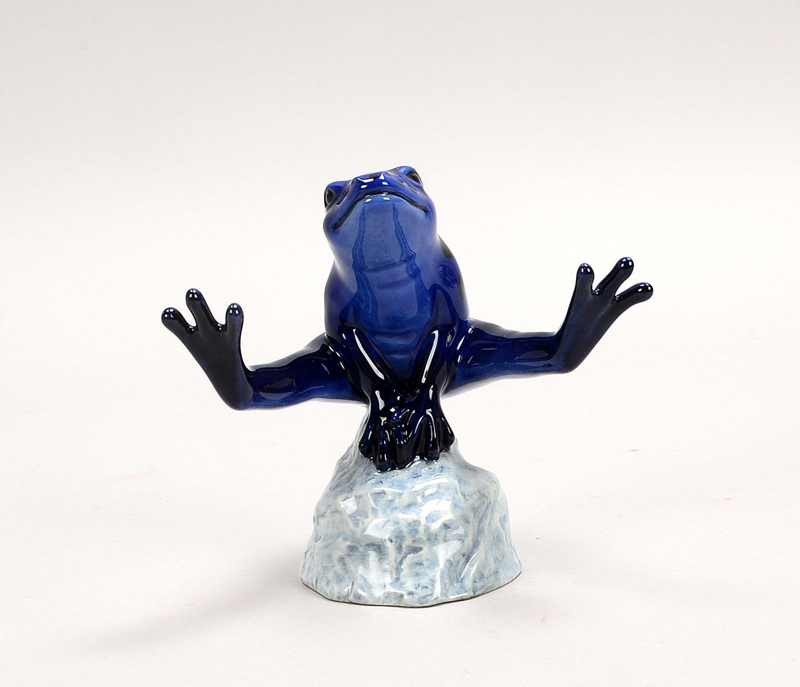 Royal Copenhagen, Porz-Figur, 'Springender Frosch', Mod. '557', in OVP; Höhe 11 cm