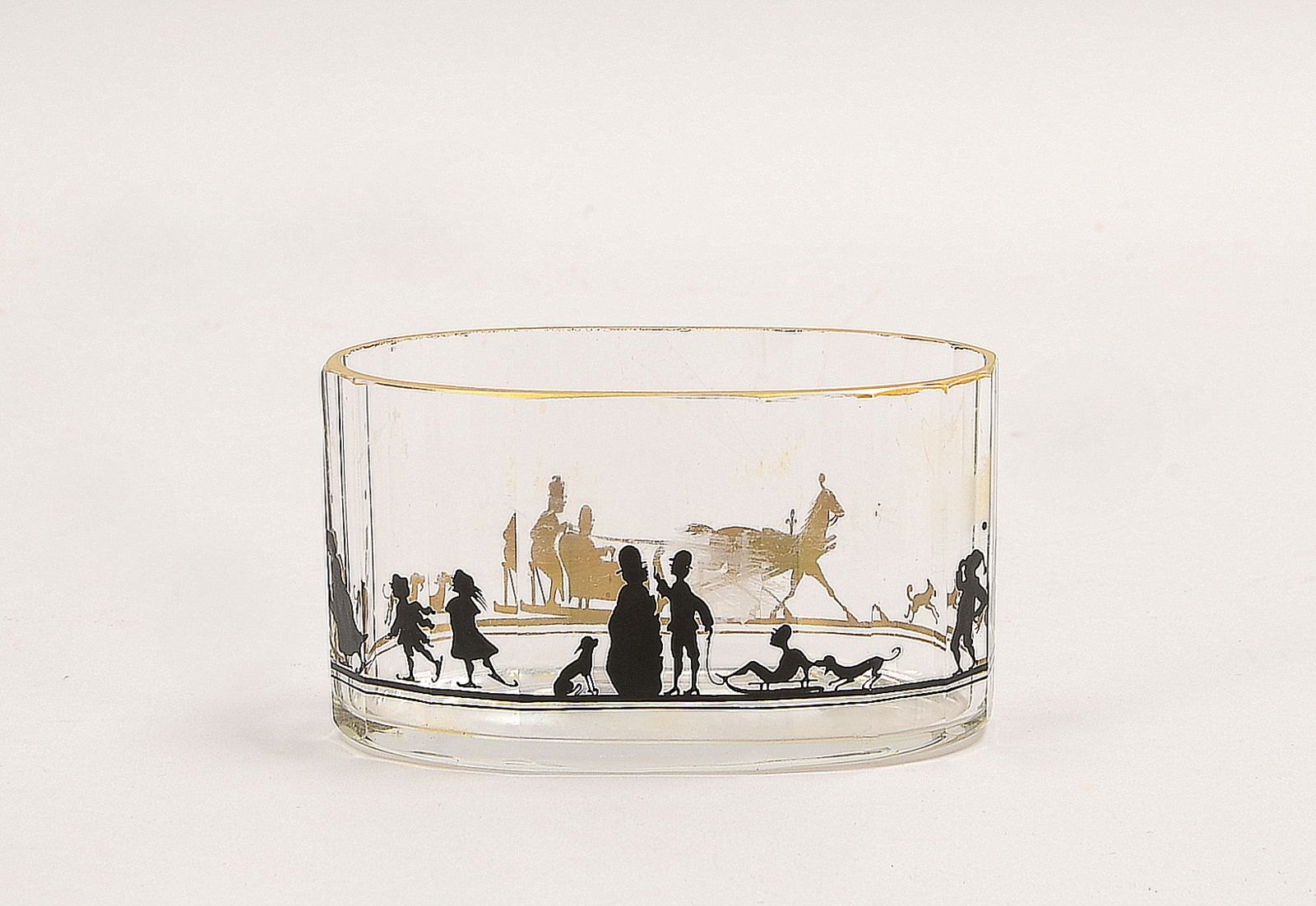 Haida, ovale Glasschale, fac. Glas, umlaufend mit Silh.-Malerei, Goldrand; Höhe 7 cm