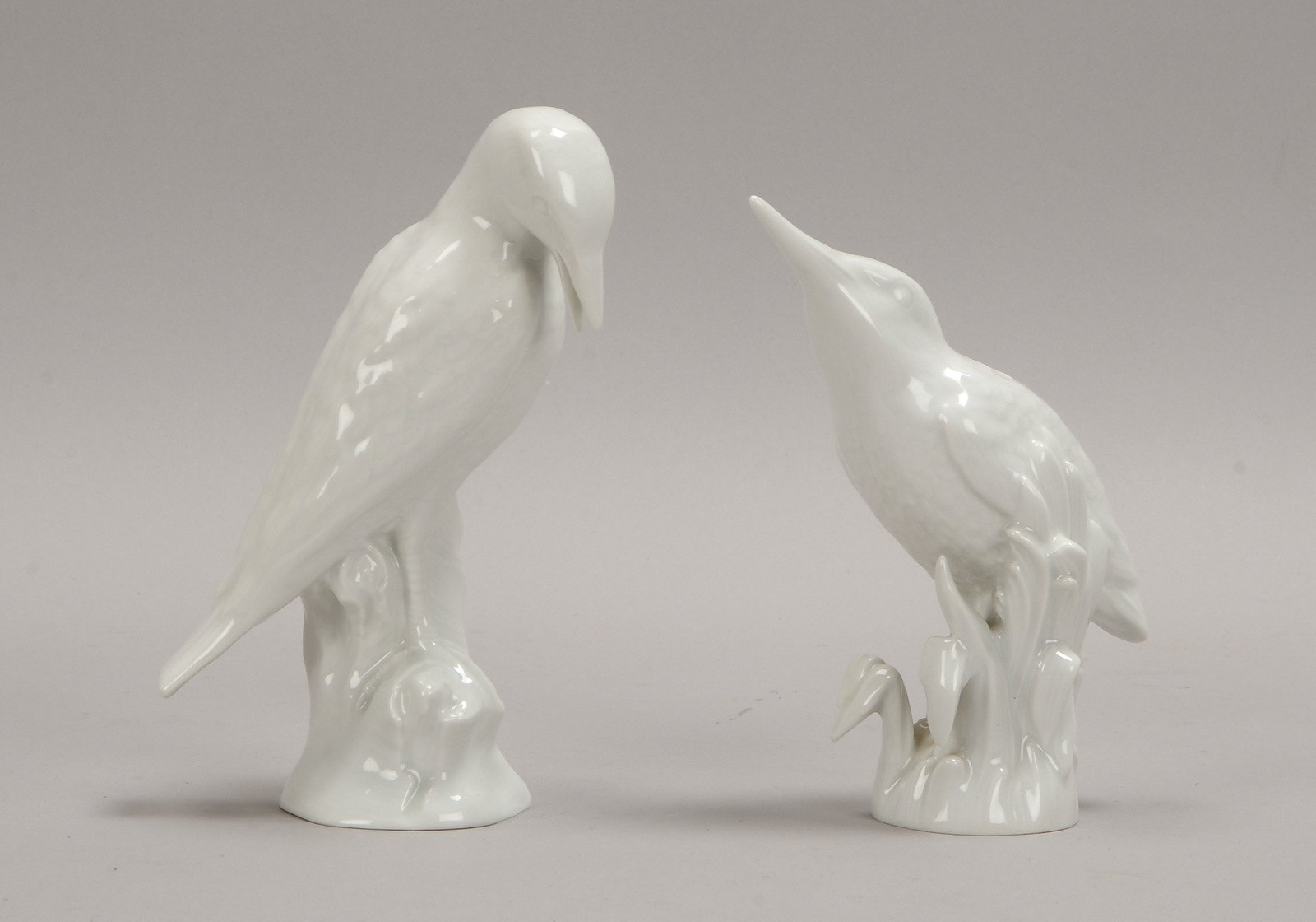 KPM Berlin, 2 Porz.-Figuren: 1x 'Eisvogel', Höhe 15 cm, und 1x 'Specht', Höhe 17 cm