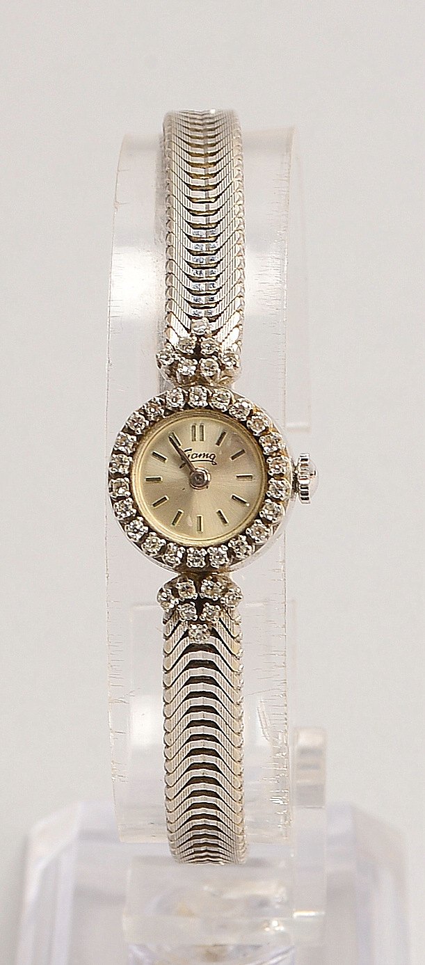 DAU Gama, Handaufz., 750 WG-Geh./Armb., Diam.-Lünette - Uhr läuft an; Gew. 24 g