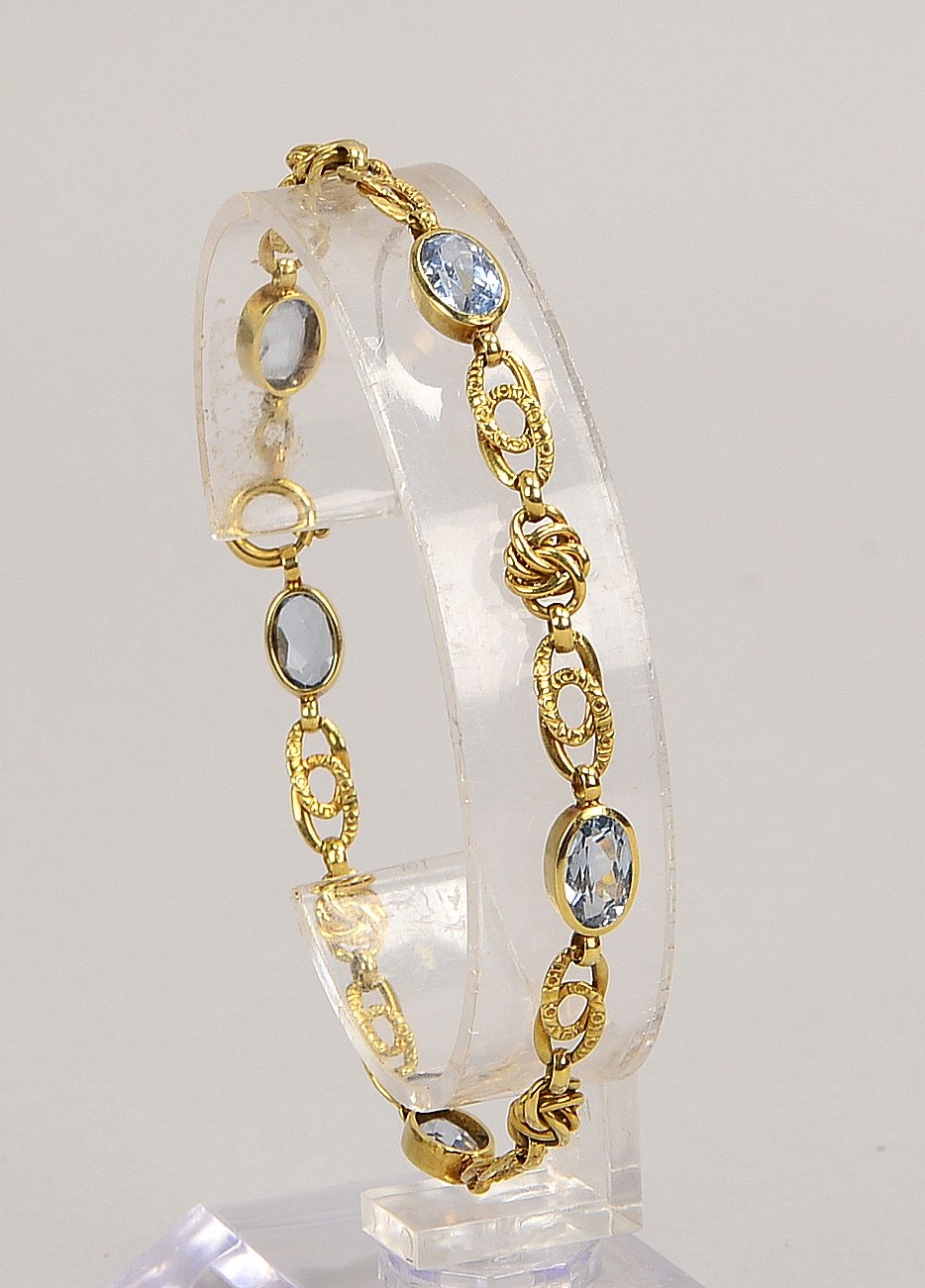Armband, 585 GG (gepr.), mit 5x Blautopasen, fac. ovale Steine; Gew. 6,30 g