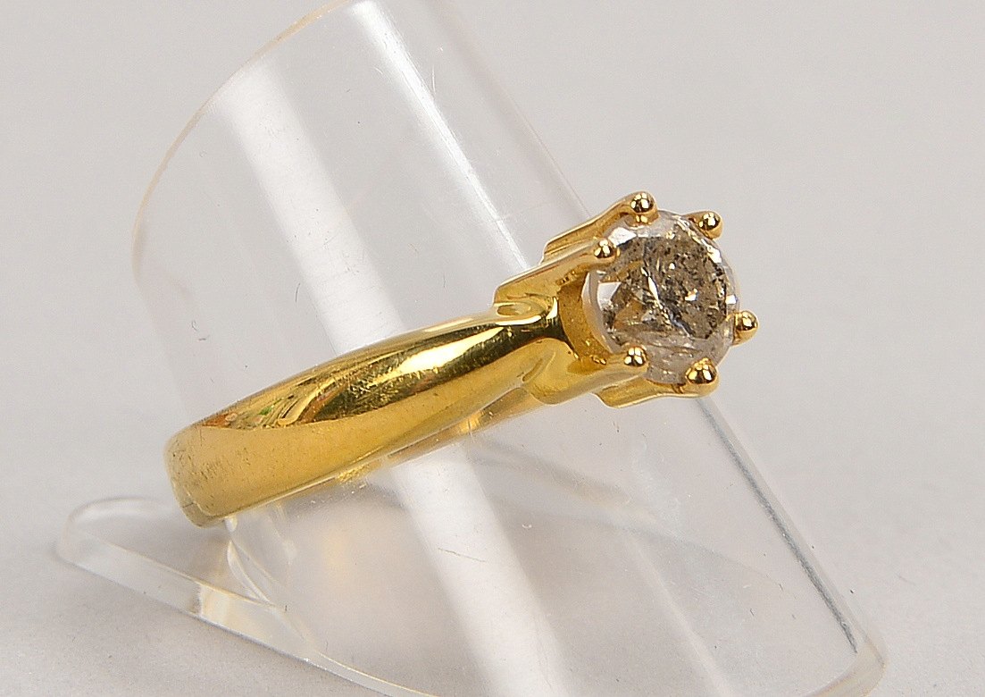 Ring, 585 GG (gest.), mit Brillant von ca. 1,0 ct, Farbe Weiß, 'P1-P2'; RG 63, Gew. 5,40 g