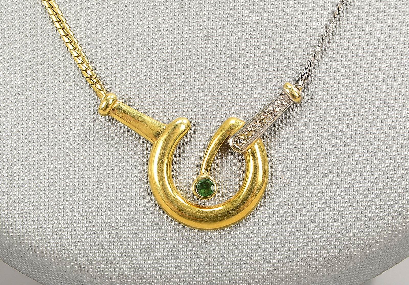 Collier, 585 GG/WG (gest.), Anh. mit Smaragd und 4x Diamantsplittern; Gew. 7,40 g