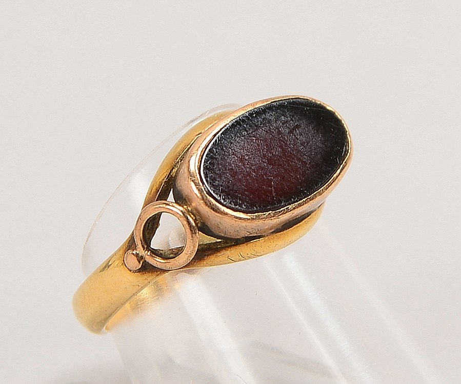 Herrenring, 585 GG (gest.), besetzt mit einer Carneolplatte; RG 56, Gew. 4,20 g