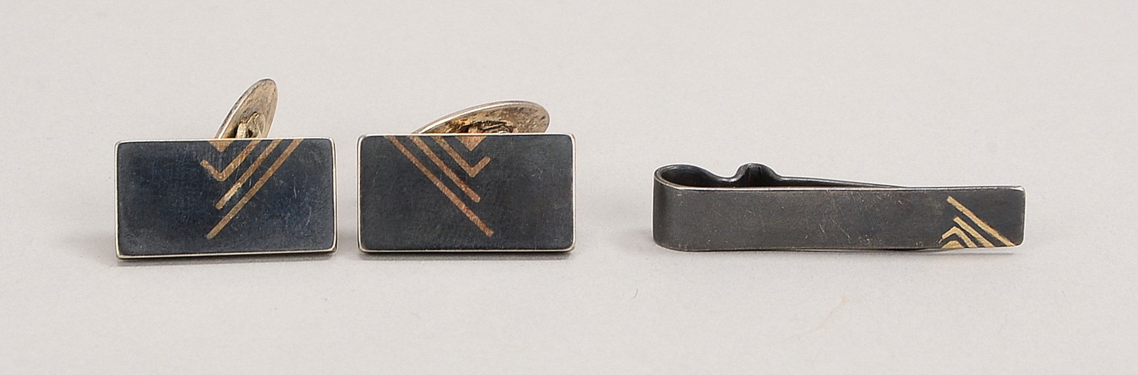 Erich Hergert, Schmuckset, Silber/Gold: Krawattenn. und Paar Manschettenkn.; Gew. 16,80 g