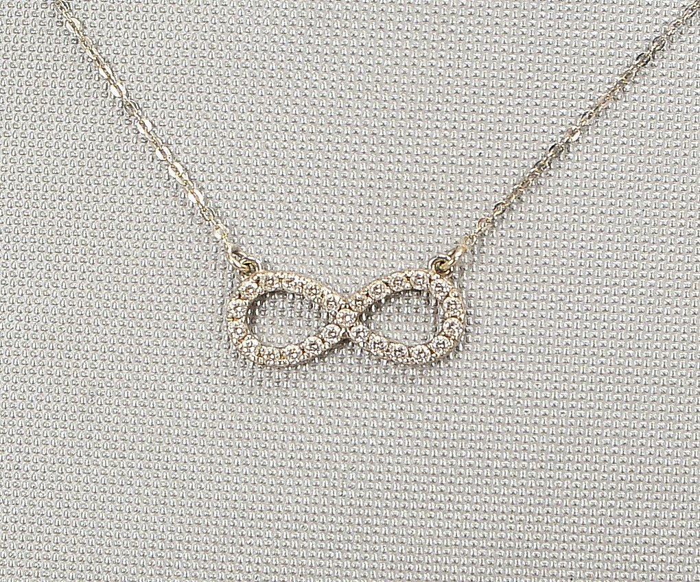 Halskette, 375 WG (gest.), mit 'Infinity'-Anhänger; Länge Kette 44 cm, Gew. 1,20 g