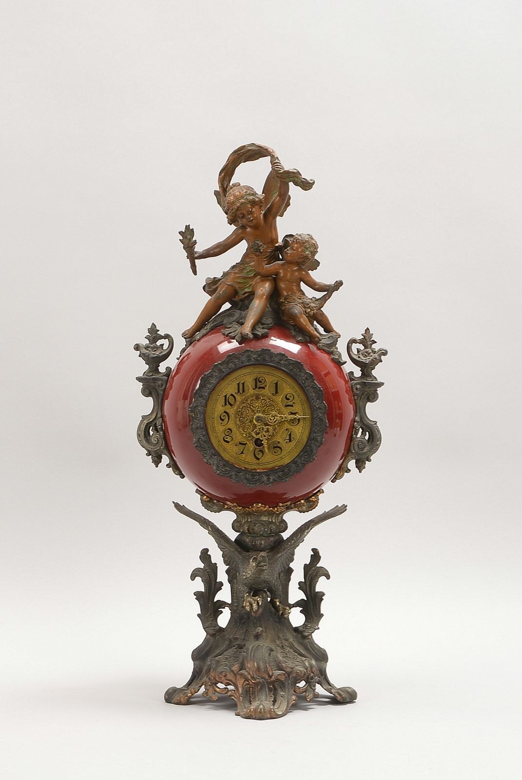 Figürl. Kamin-/Tischuhr, Lenzkirch-Uhrw., Steingut/Bronze, Messing-Zeiger/Ziffernbl.