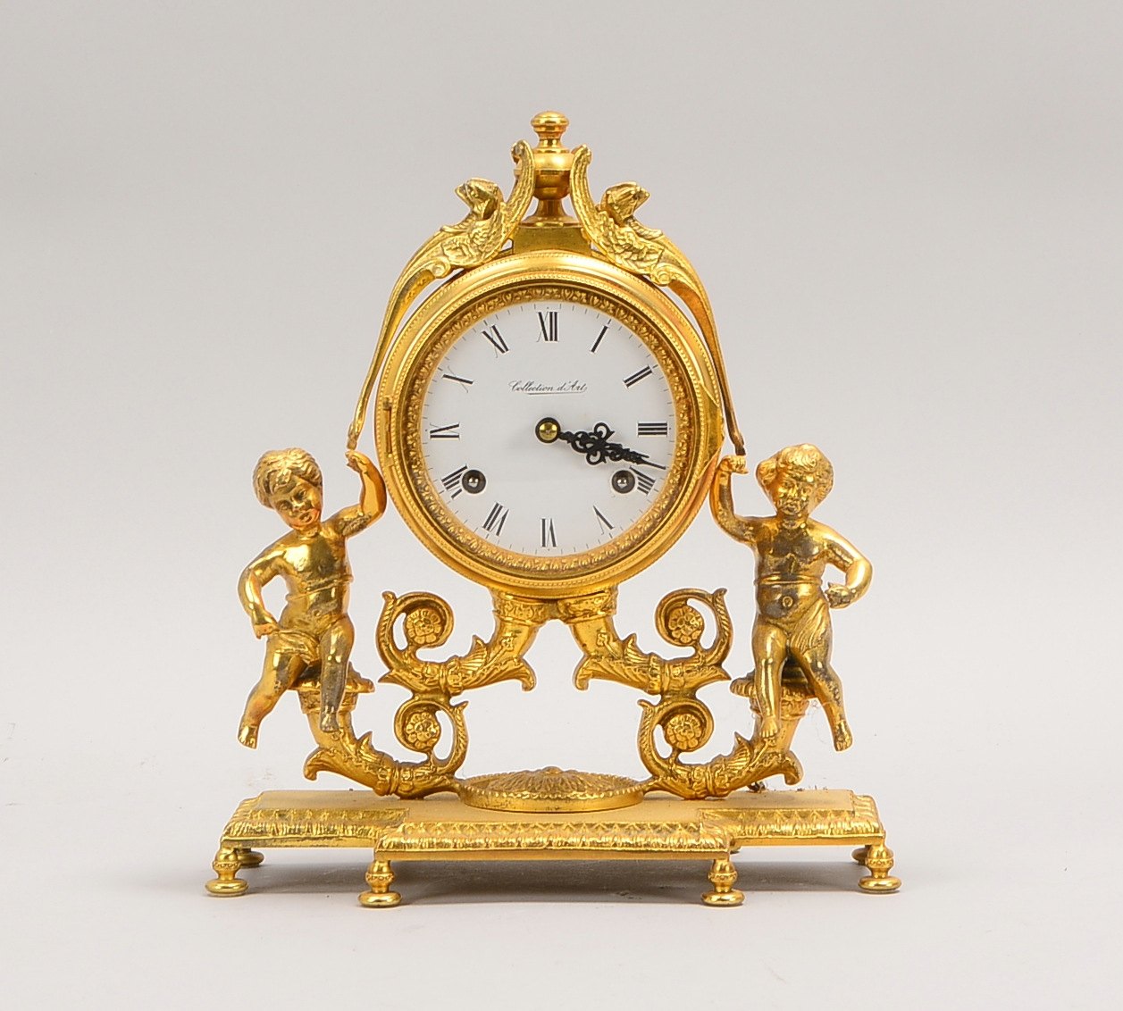 Tischuhr, Hermle 'Collection d'Art', Messing-Uhrw., Geh. Messing/Bronze und Emaille