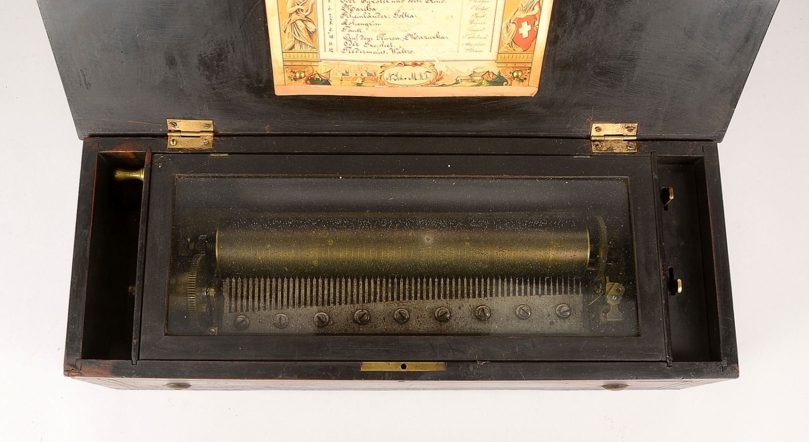 Alte Walzenspieluhr, Holzkorpus innen mit Glas-Zwischeneinsatz, mit 12x Melodien